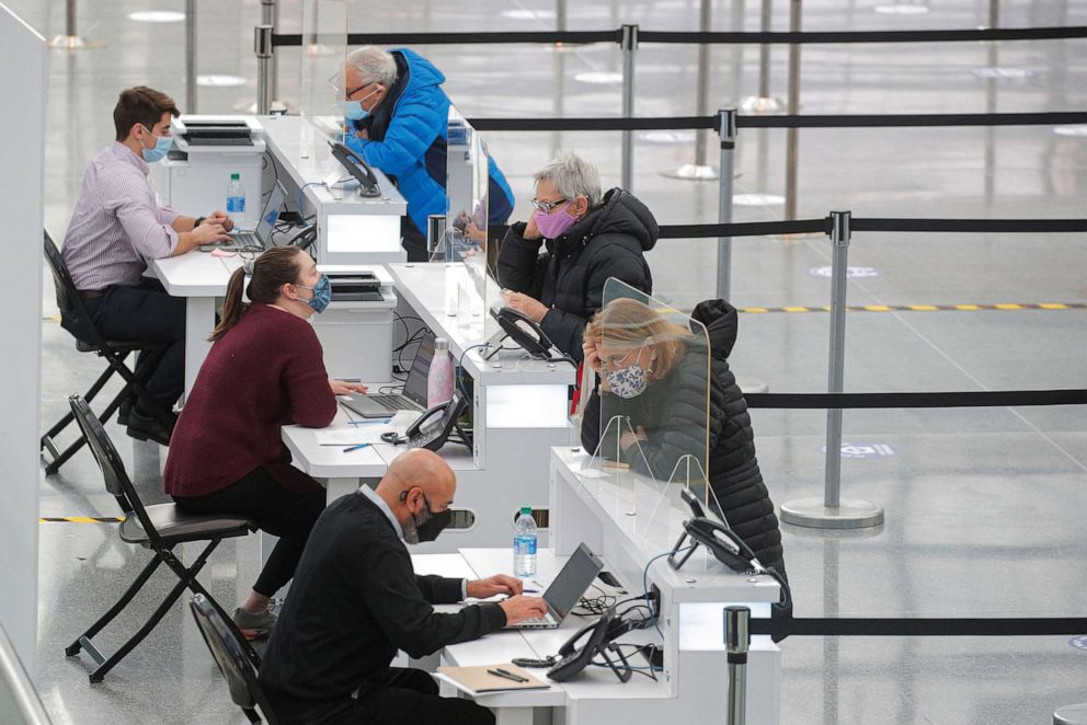 PHOTO: People arrive to receive COVID-19 vaccine doses at the New York State COVID-19 vaccination site at the Jacob K. Javits Convention Center in New York City, Jan. 13, 2021.