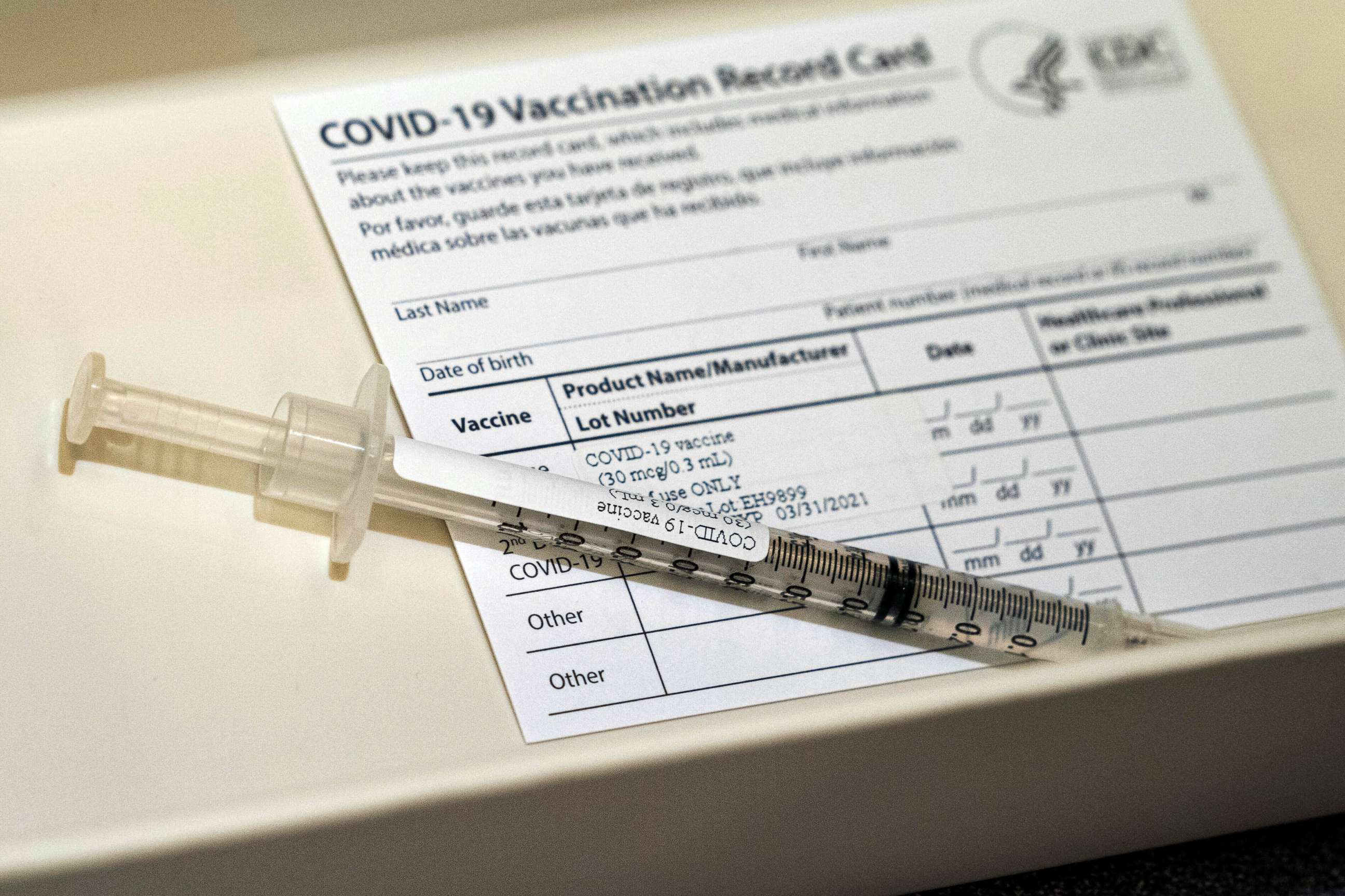 PHOTO: In this Dec. 16, 2020 file photo, a syringe containing a dose of Pfizer's COVID-19 vaccine sits in a container during a vaccine clinic at Providence Alaska Medical Center in Anchorage, Alaska.