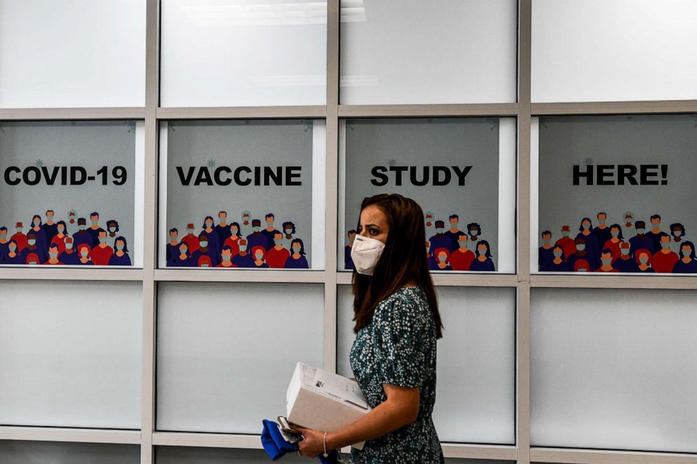 PHOTO: A woman walks inside the Research Centers of America in Hollywood, Fla., on Aug. 13, 2020, which is conducting COVID-19 vaccine trials.