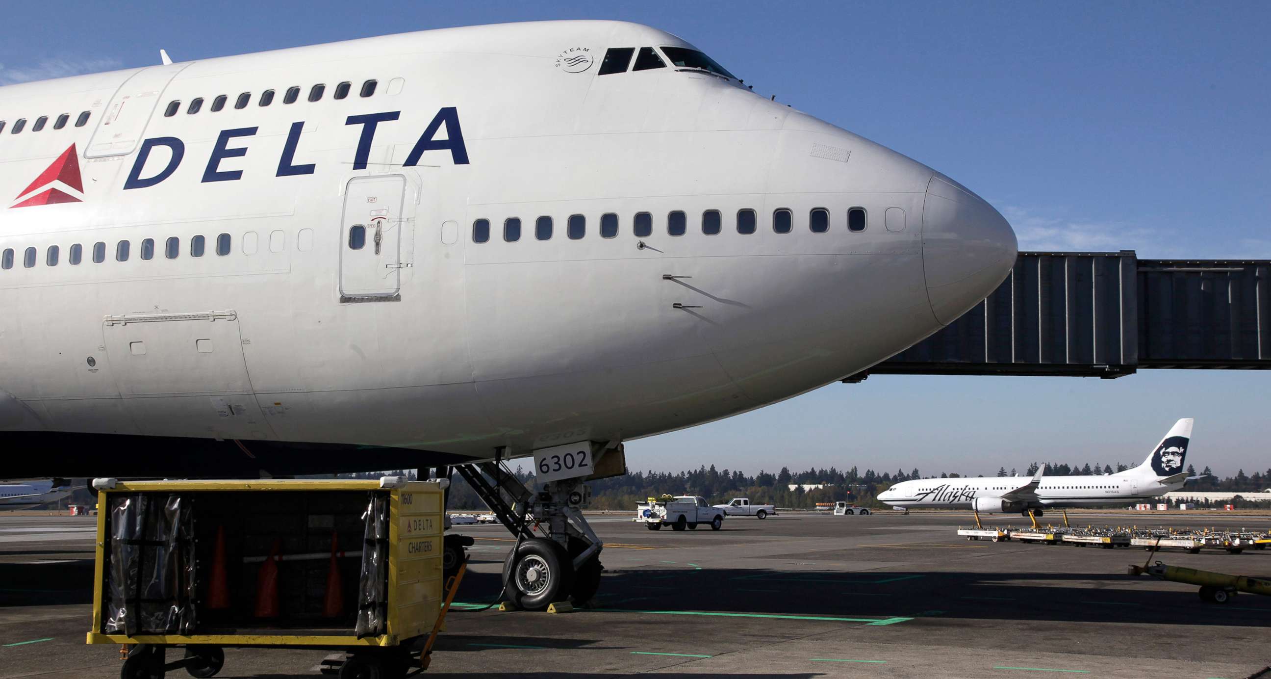 PHOTO: Delta Air Lines airplane sits at Seattle-Tacoma International Airport in Seattle, Oct. 9, 2012.