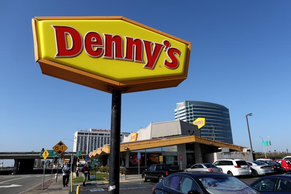 PHOTO: A sign is posted in front of a Denny's restaurant, Feb. 13, 2023, in Emeryville, Calif.