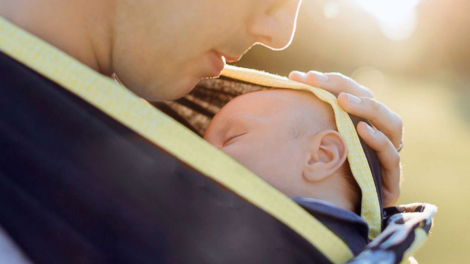 PHOTO: A father holds his baby in an undated stock photo.