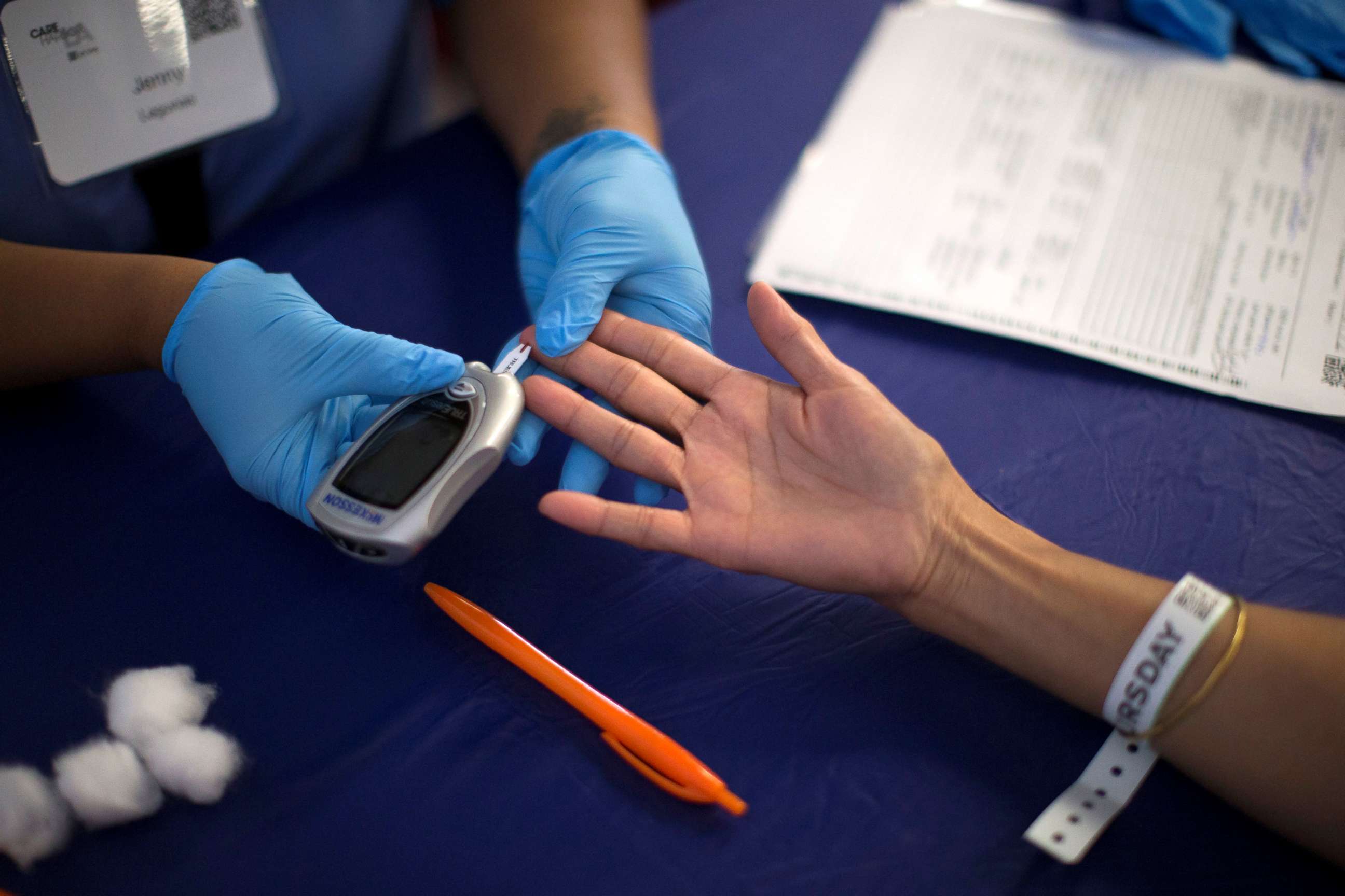 PHOTO: A person receives a test for diabetes during a fee medical clinic in Los Angeles, Sept. 11, 2014.