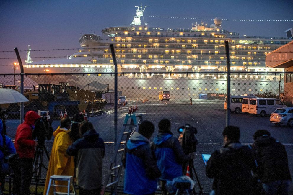 PHOTO: A bus arrives near the cruise ship Diamond Princess, where dozens of passengers were tested positive for coronavirus, at Daikoku Pier Cruise Terminal in Yokohama, Japan, Feb. 16, 2020.
