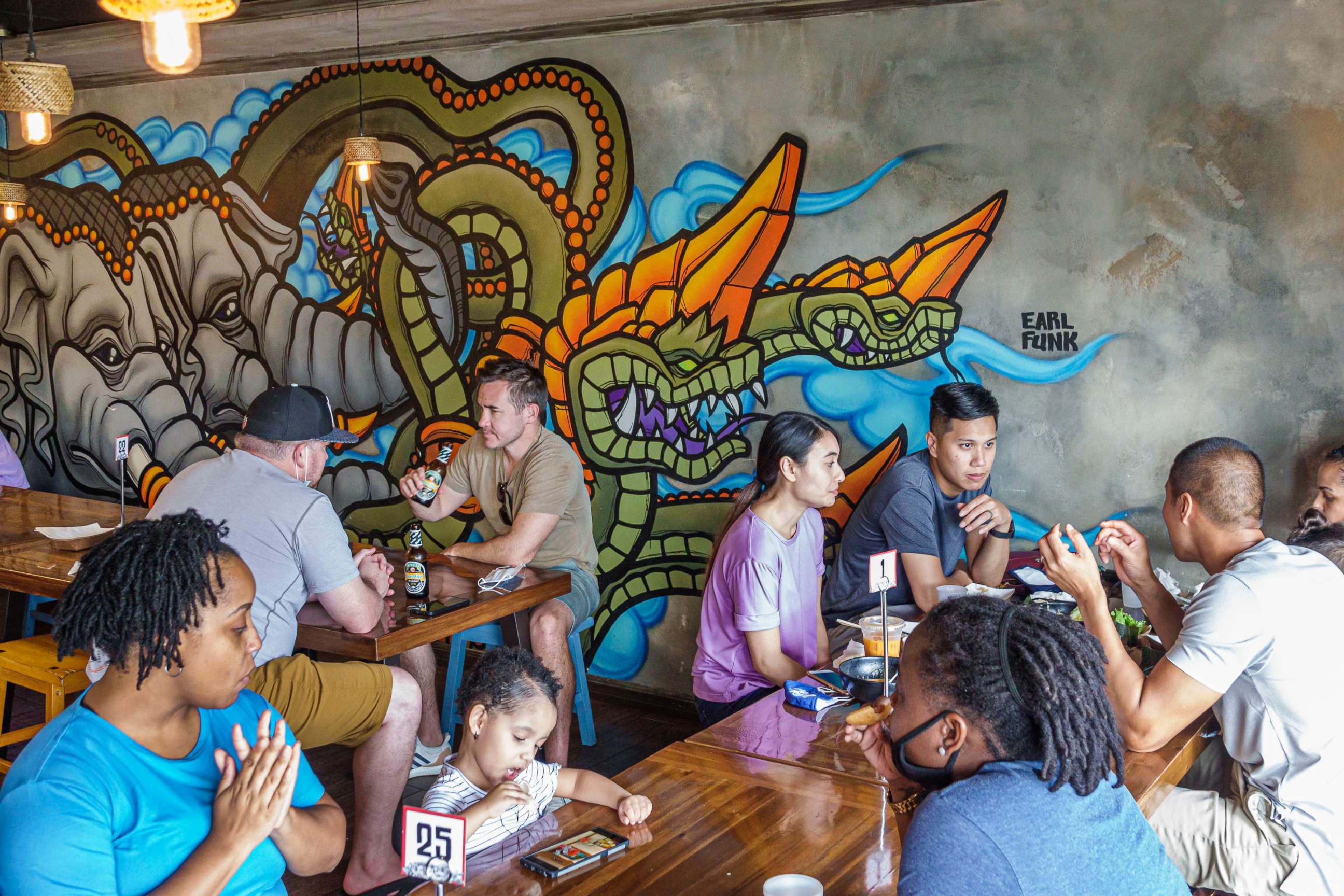 PHOTO: People eat at Little Saigon in Orlando, Fla., Sept. 27, 2020.