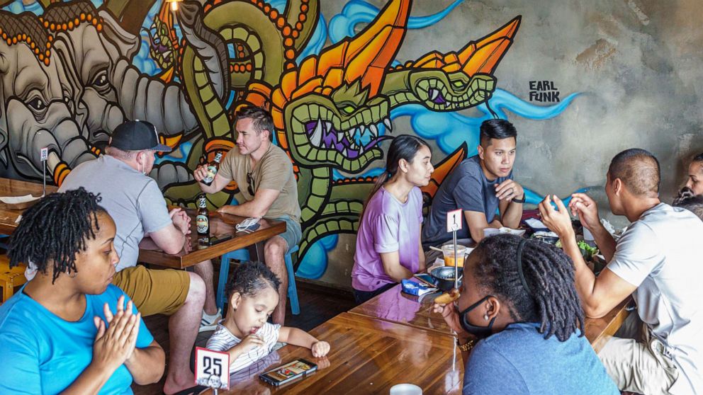 PHOTO: People eat at Little Saigon in Orlando, Fla., Sept. 27, 2020.