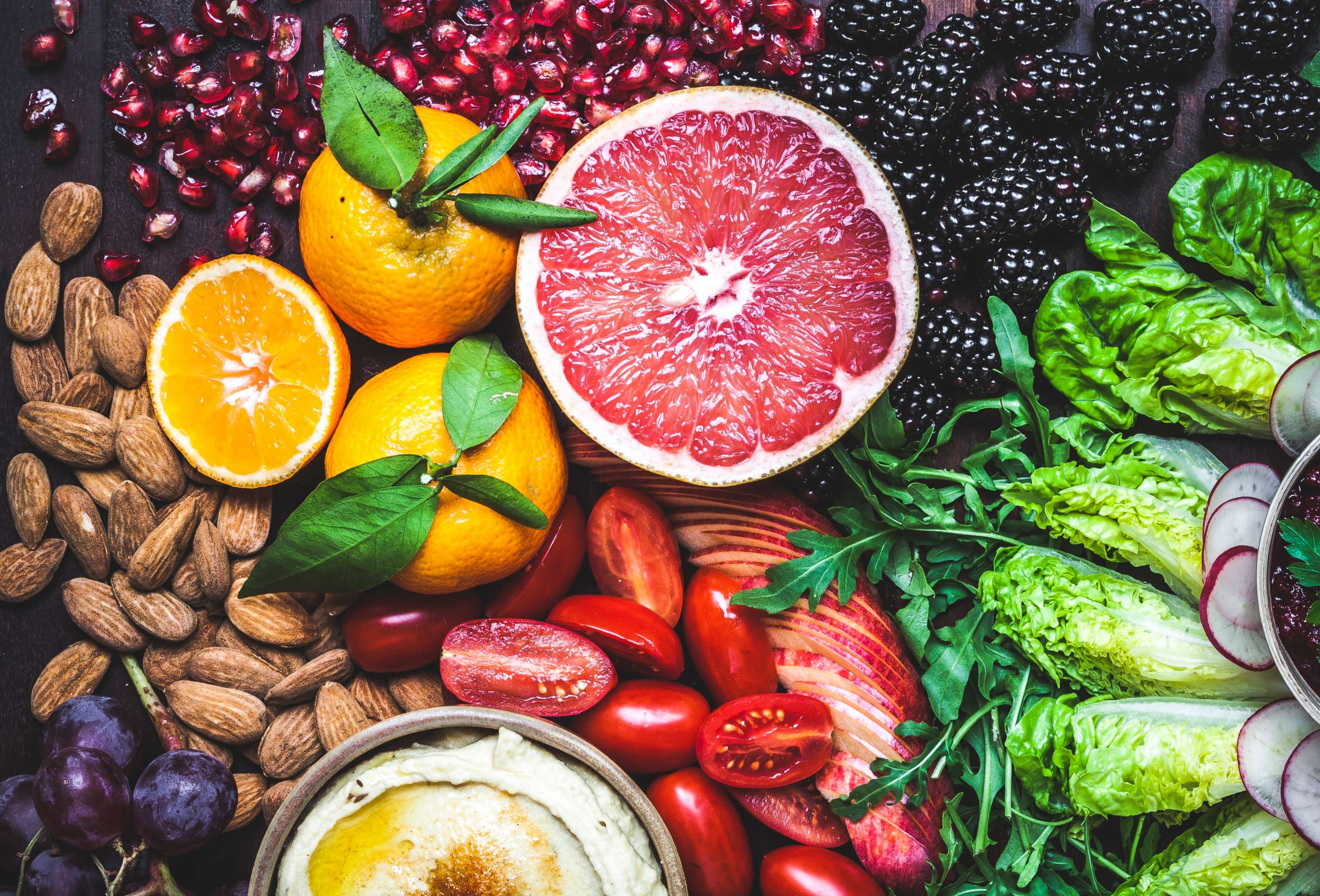 PHOTO: A rainbow of colors and textures in this vibrant and healthy snack board of fruit, vegetables, dips, nuts and olives.