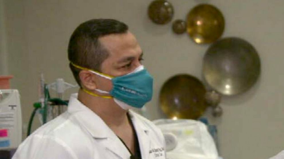 PHOTO: Dr. Juan Marcos Chavez Paz, a critical care physician at DHR Health speaks with ABC News' Mireya Villarreal.