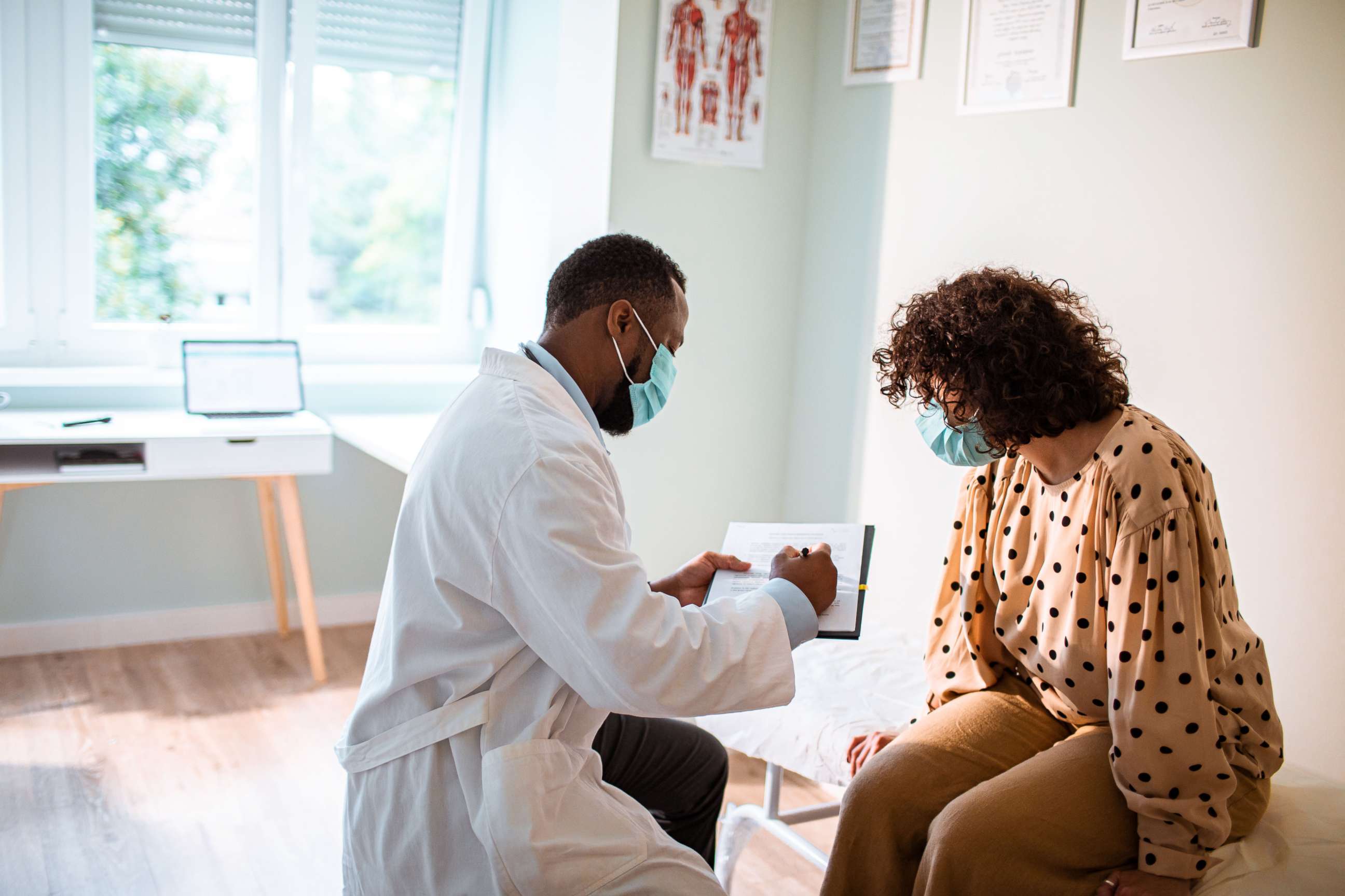 PHOTO: A doctor consults a patient in this stock photo.