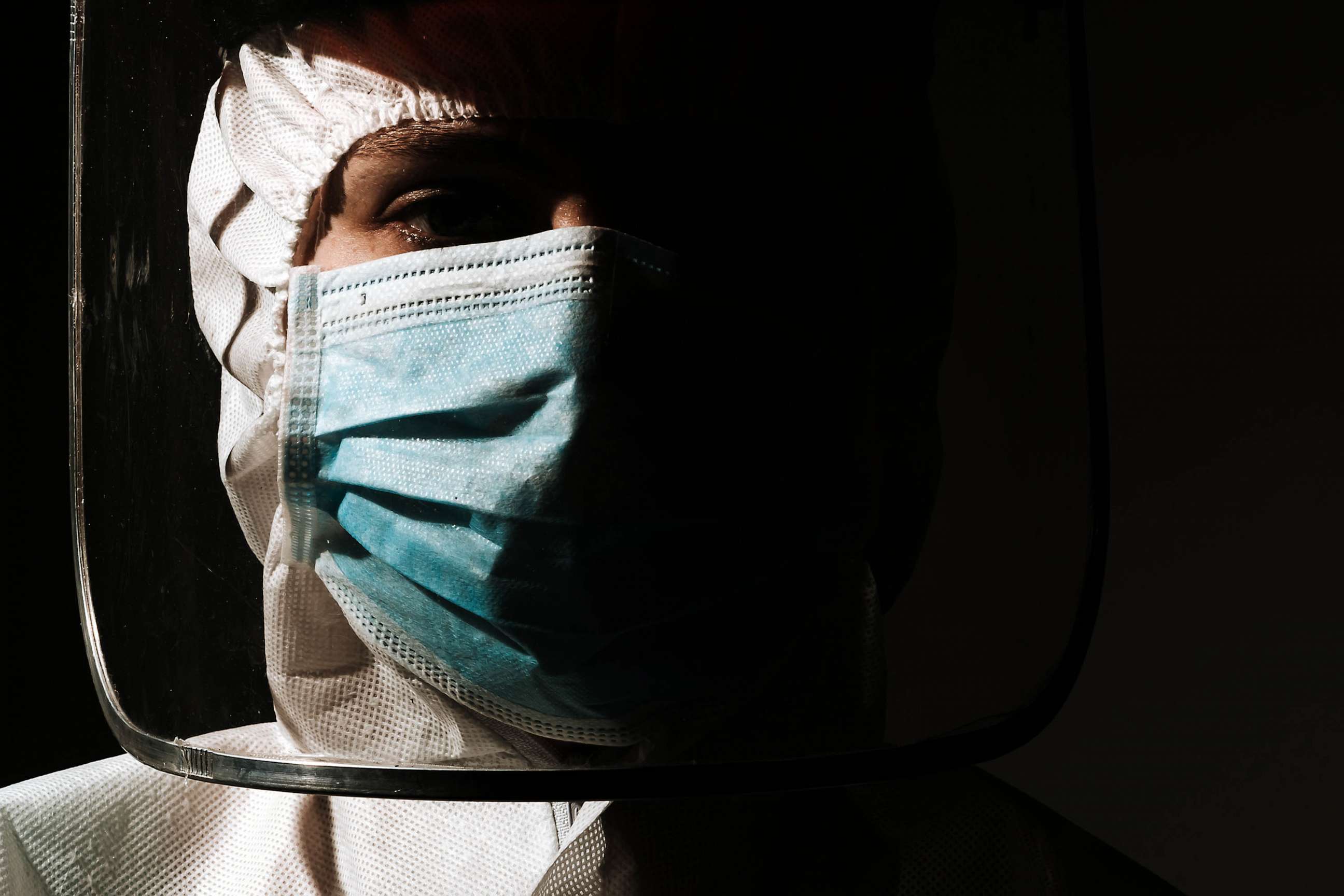 STOCK PHOTO: A Doctor wears mask and face shield due to Coronavirus