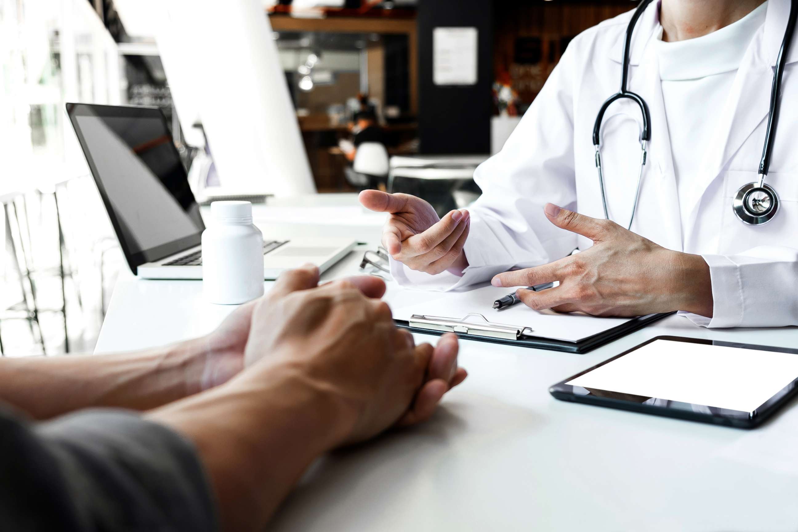 PHOTO: A stock photo depicts a doctor talking to her patient.