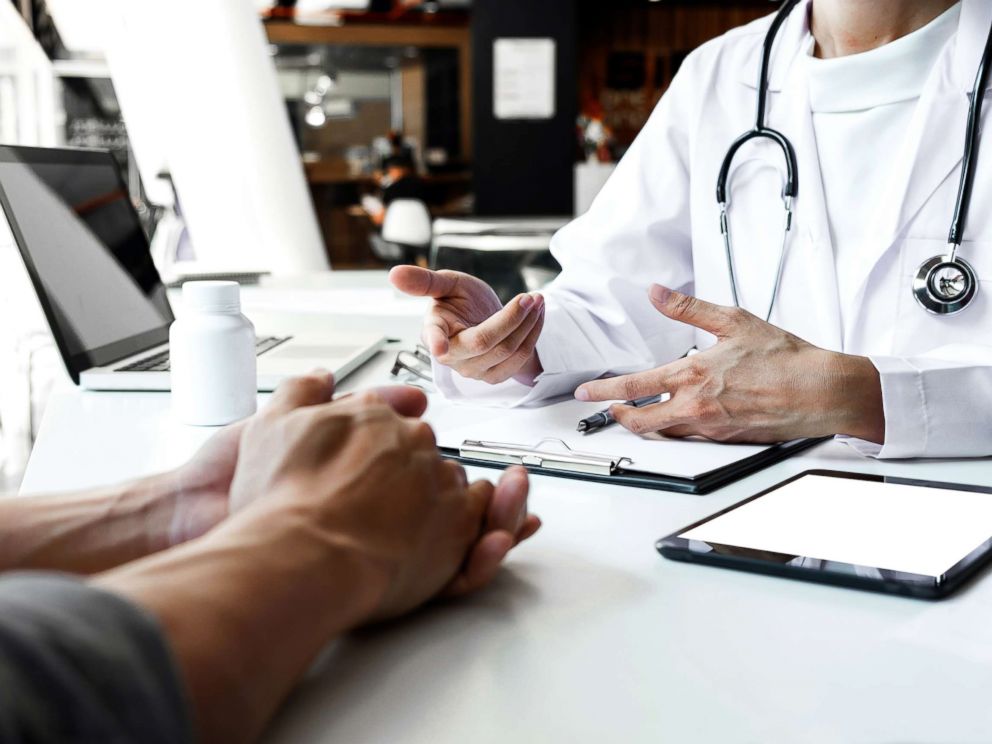 PHOTO: A stock photo depicts a doctor talking to her patient.