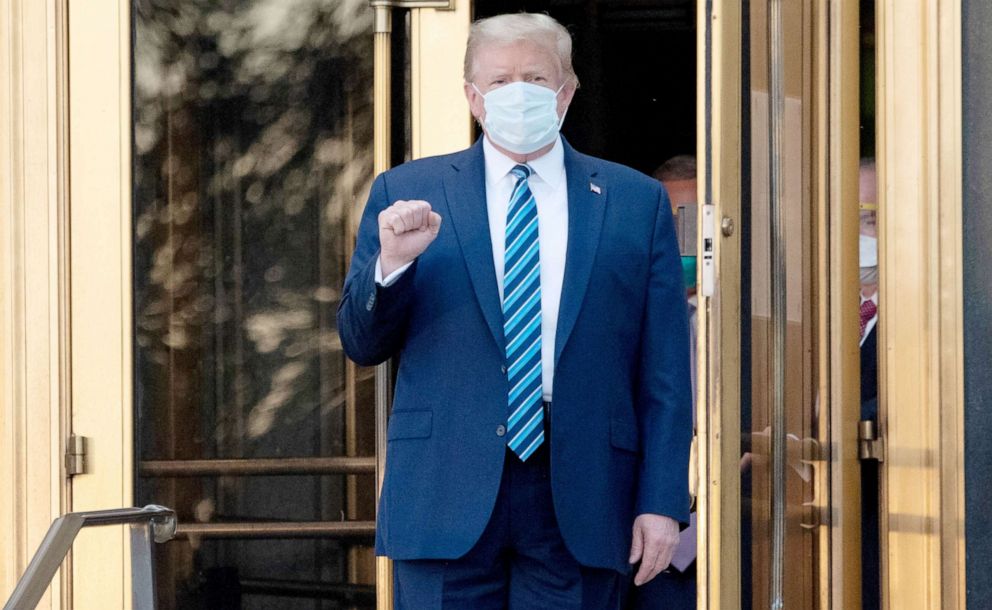 PHOTO: President Donald Trump walks out of Walter Reed Medical Center in Bethesda, Md. after being treated for Covid-19, Oct. 5, 2020.