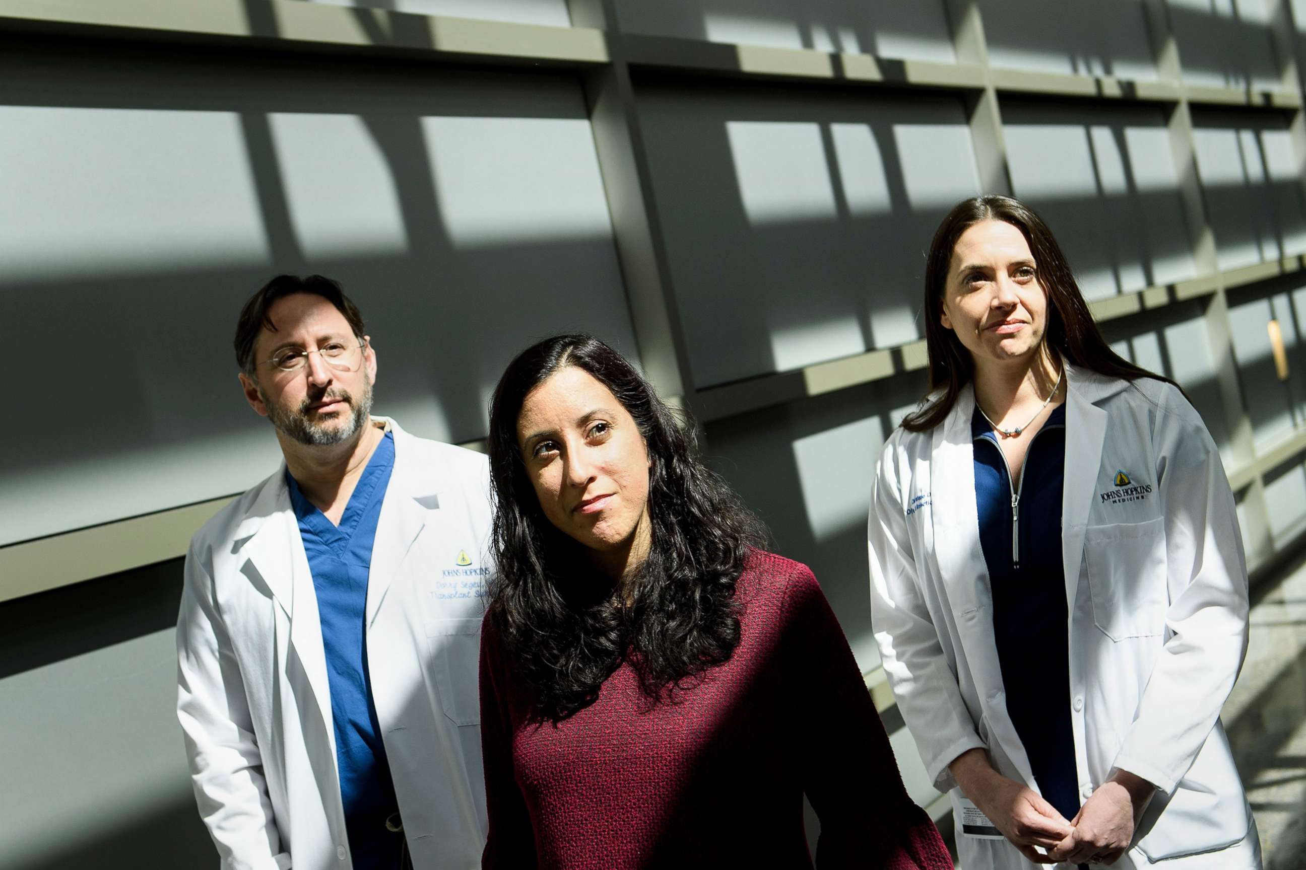 PHOTO: Organ donor Nina Martinez, center, poses with Dr. Dorry Segev and Dr. Christine Durand of Johns Hopkins after she participated in the first HIV-positive patient to HIV-positive patient kidney transplant, March 28, 2019, in Baltimore, Md.