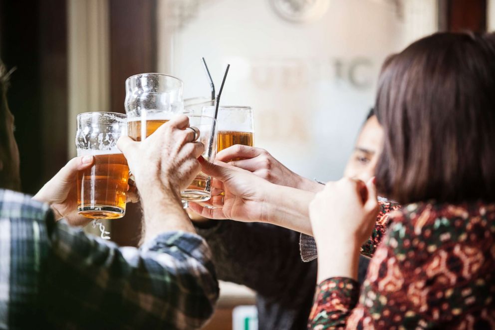 PHOTO: Friends toast at a bar in this undated stock photo.