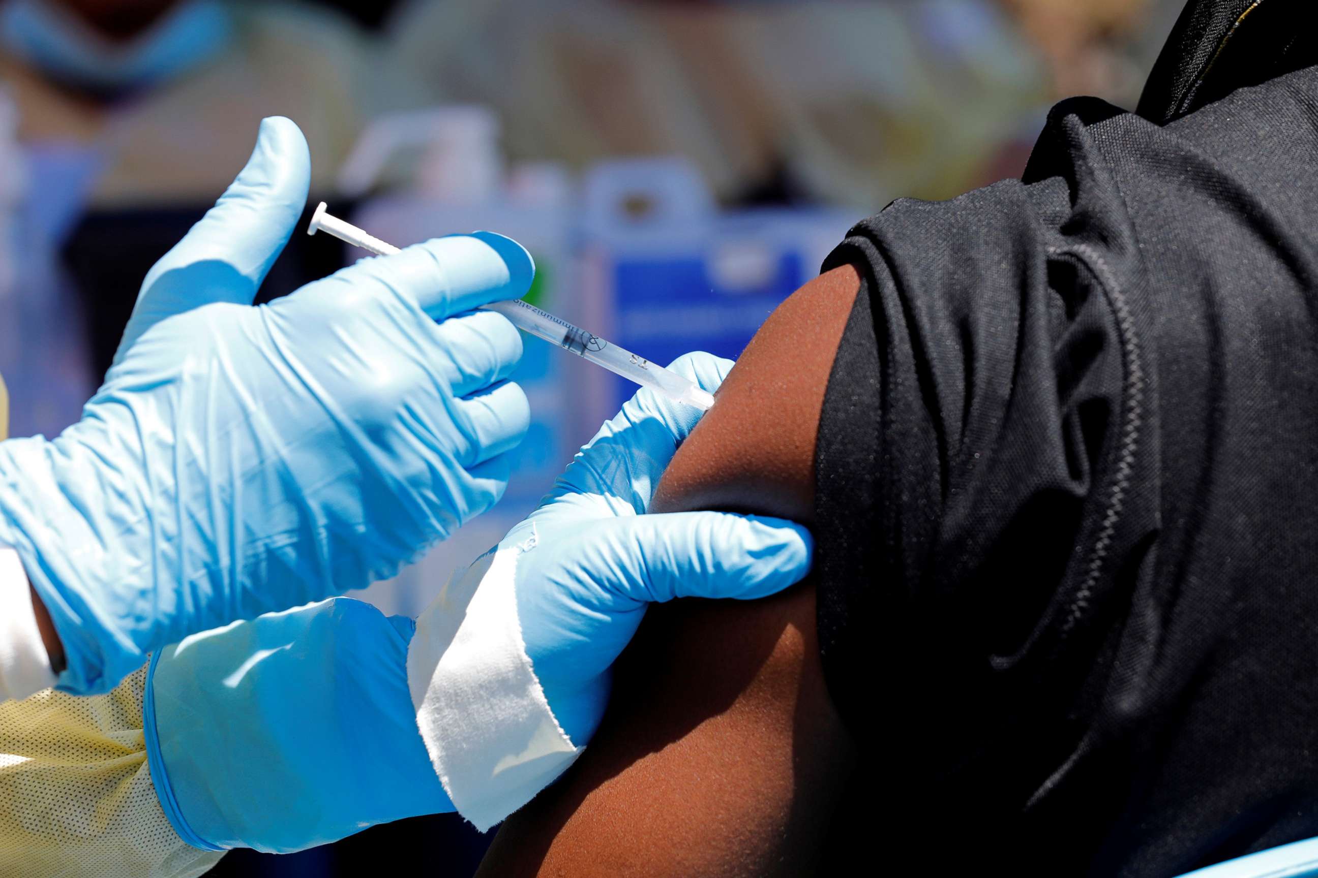 PHOTO: In this Aug. 5, 2019, file photo, a health worker injects a man with Ebola vaccine in Goma, Democratic Republic of Congo.