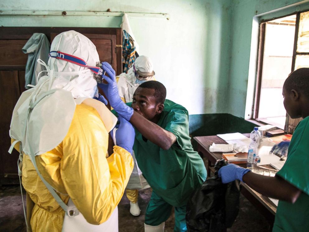 PHOTO: A handout photograph released by UNICEF on May 13, 2018 shows health workers wearing protective equipment as they prepare to attend to suspected Ebola patients at Bikoro Hospital in the Democratic Republic of Congo, May 12, 2018.
