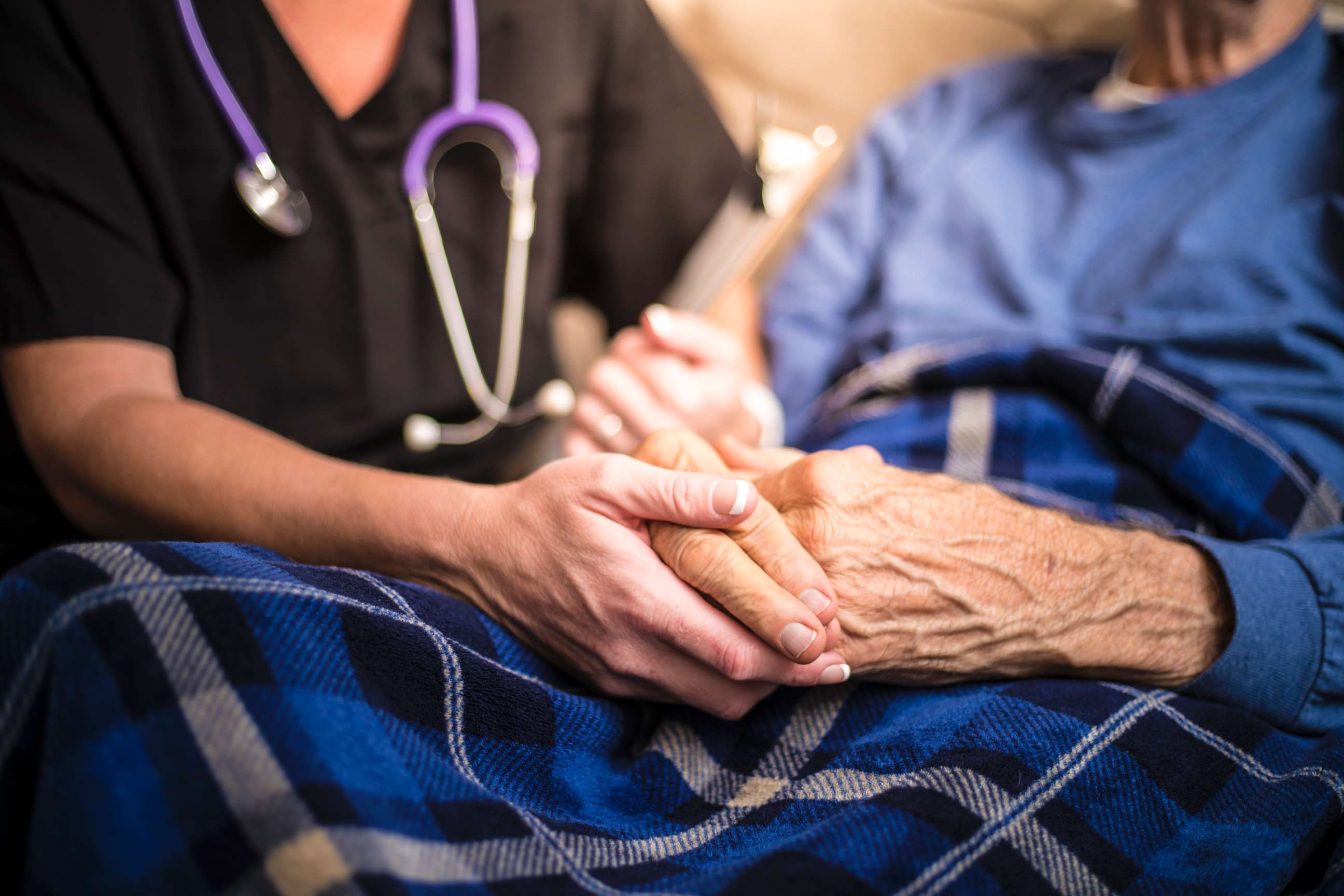 PHOTO: An undated stock photo of a healthcare worker with an elderly patient. 