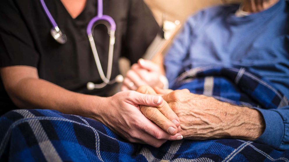 PHOTO: An undated stock photo of a healthcare worker with an elderly patient. 