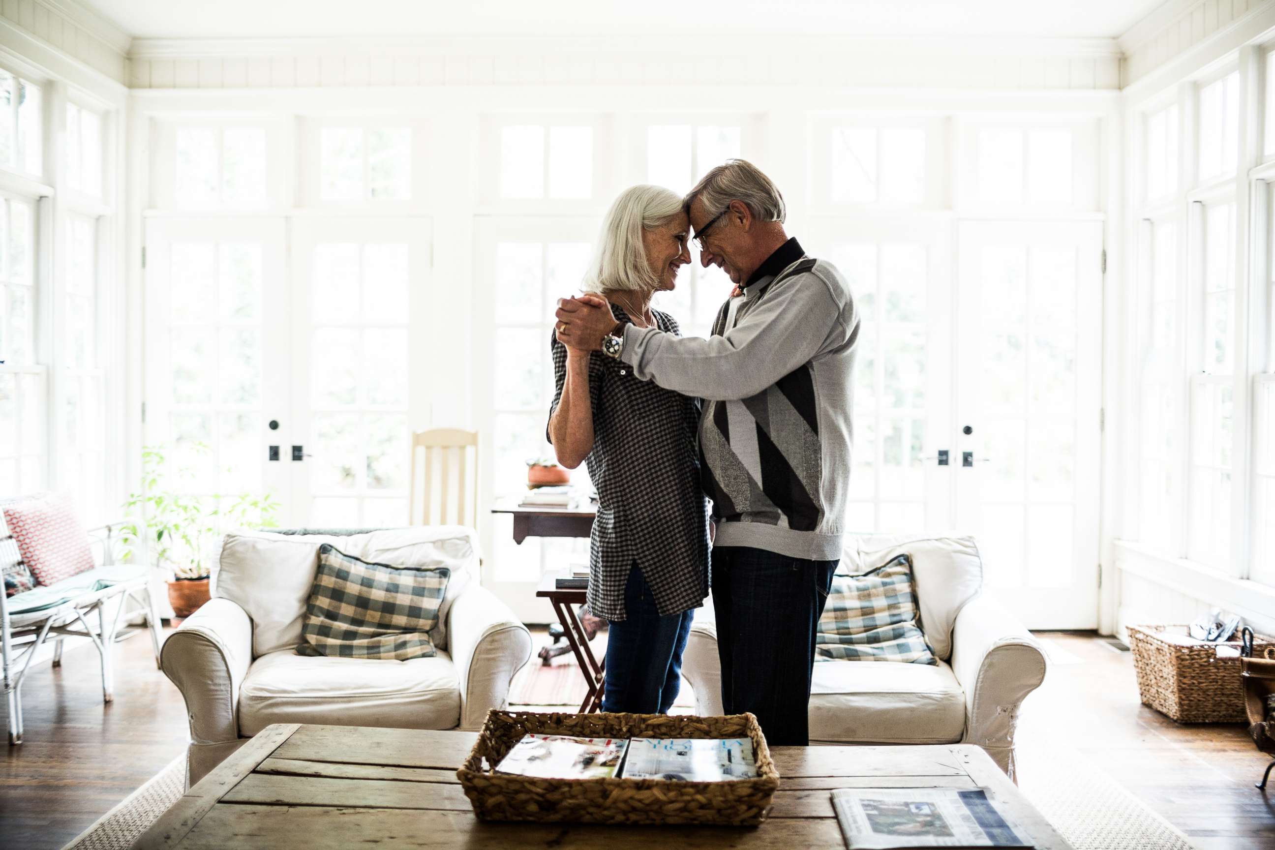 PHOTO: An elderly couple embrace in this stock photo.