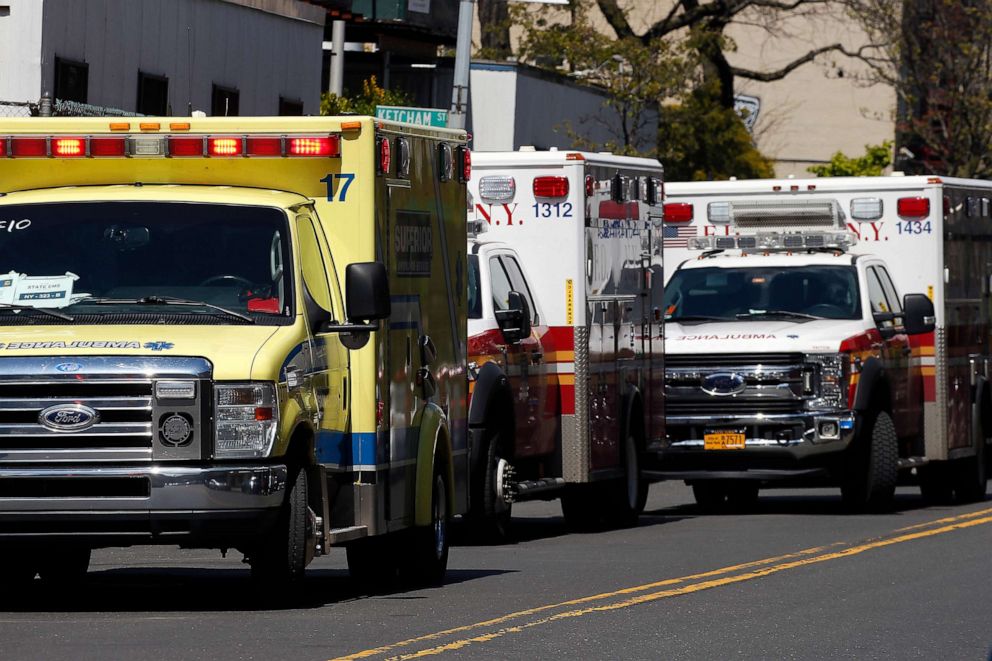 PHOTO: Ambulances are lined up outside of Elmhurst Hospital during the coronavirus pandemic, April 22, 2020, in Queens, N.Y.