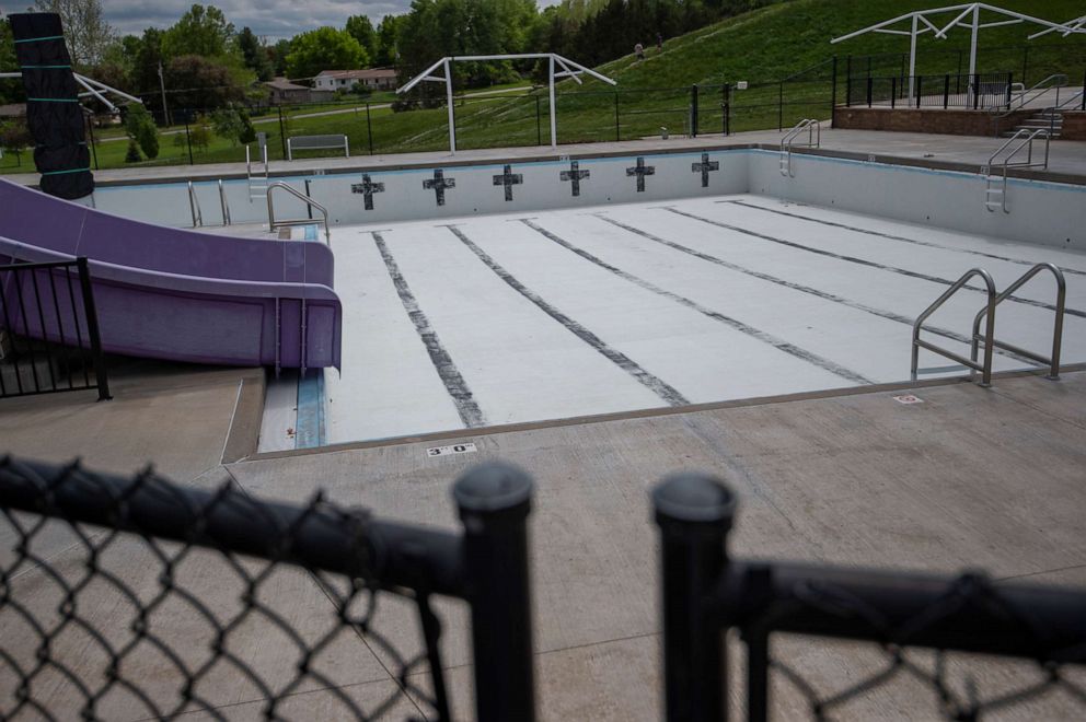 PHOTO: Cico Pool sits empty, May 17, 2020, in Manhattan, Kansasm as all public pools across the state have closed for the remainder of summer.