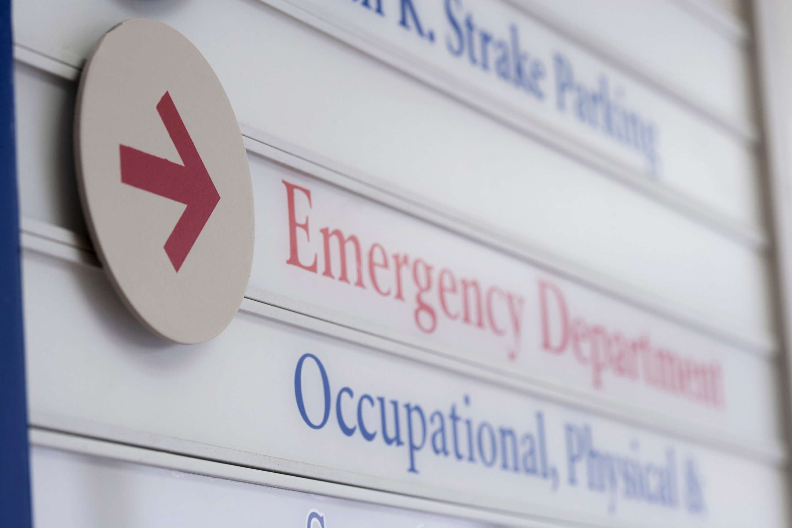 PHOTO: Close up of sign for emergency department in hospital.