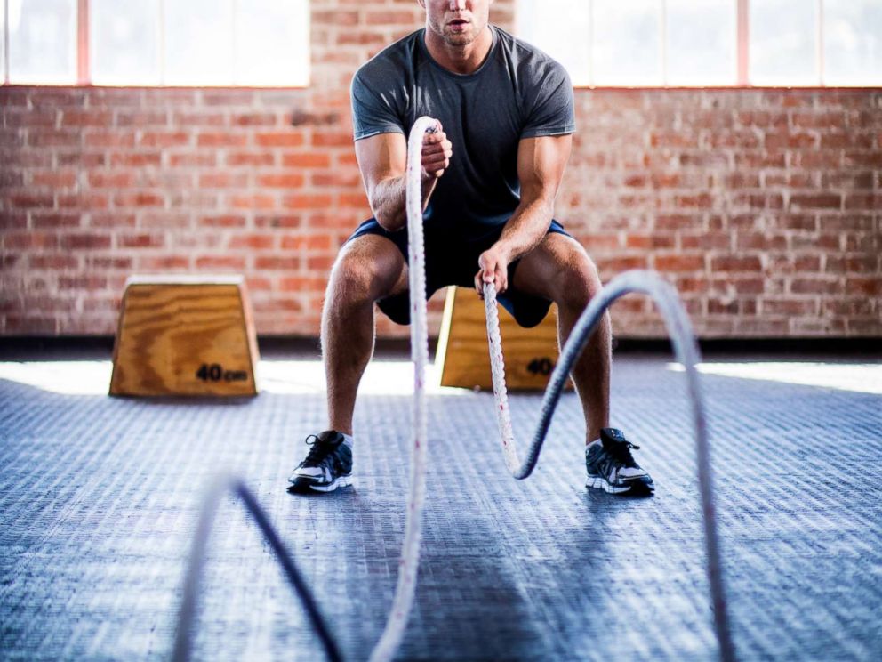 PHOTO: A man doing a battle ropes exercise at the gym appears in this undated stock photo.