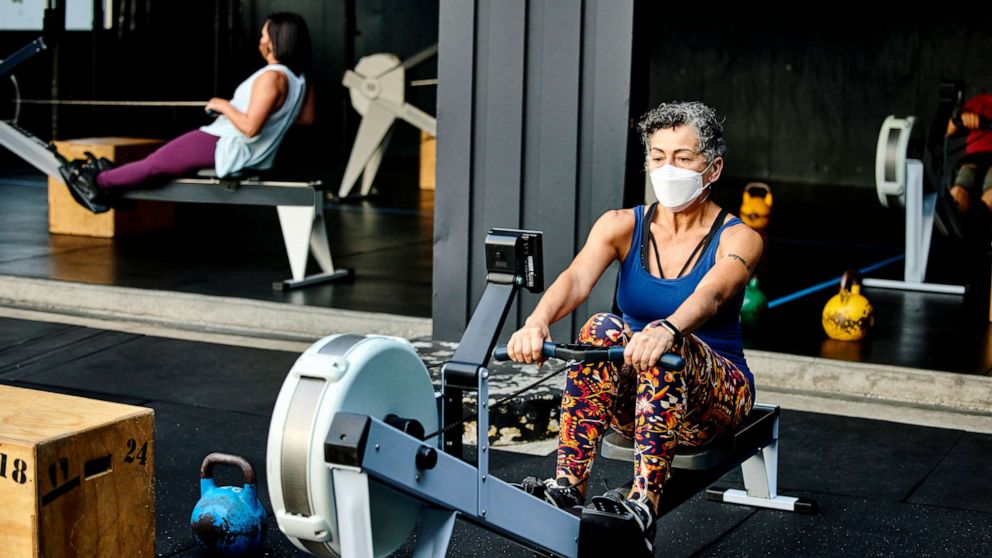 PHOTO: In this undated file photo, a woman works out on a rowing machine at a gym.