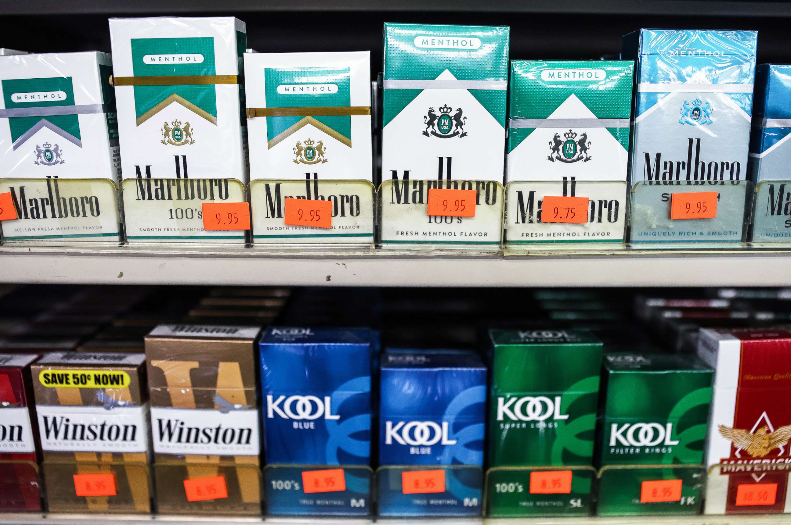 PHOTO: Packs of menthol cigarettes (top) are displayed for sale in a smoke shop on April 28, 2022 in Los Angeles.