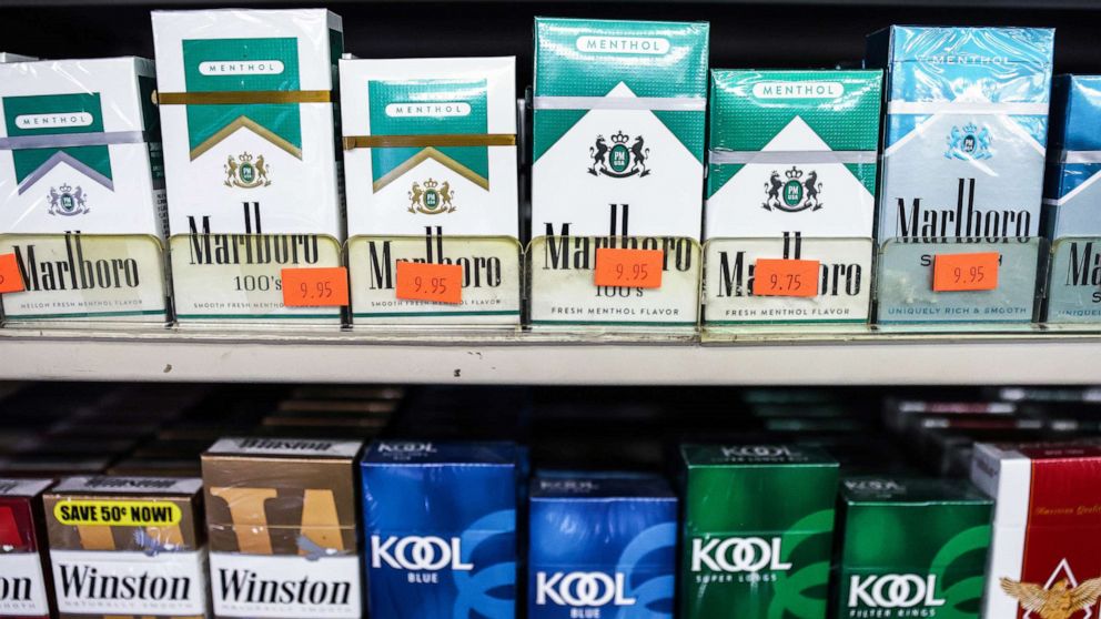 PHOTO: Packs of menthol cigarettes (top) are displayed for sale in a smoke shop on April 28, 2022 in Los Angeles.