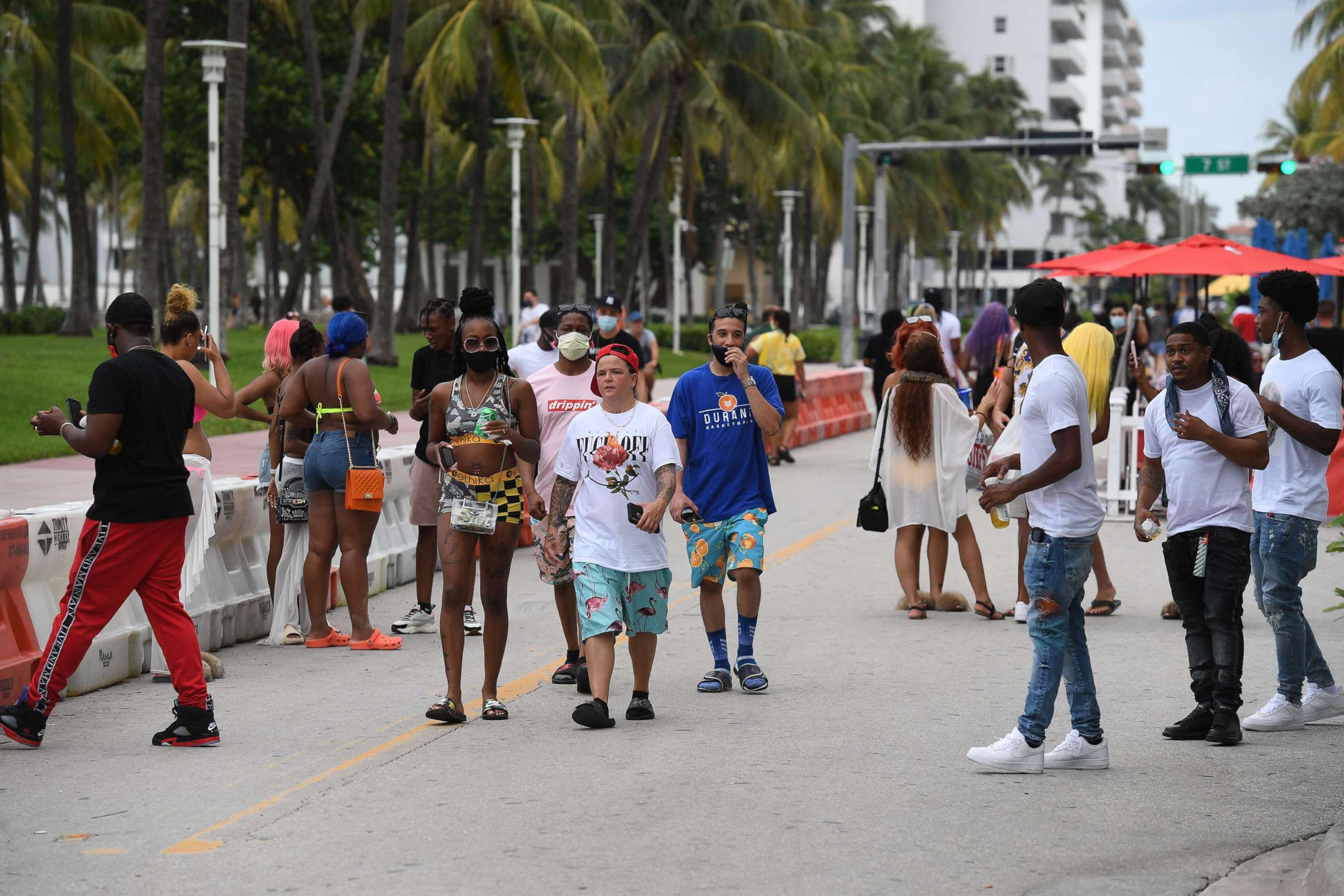 PHOTO: People walk along Ocean Drive in Miami Beach, Fla., on July 15, 2020.