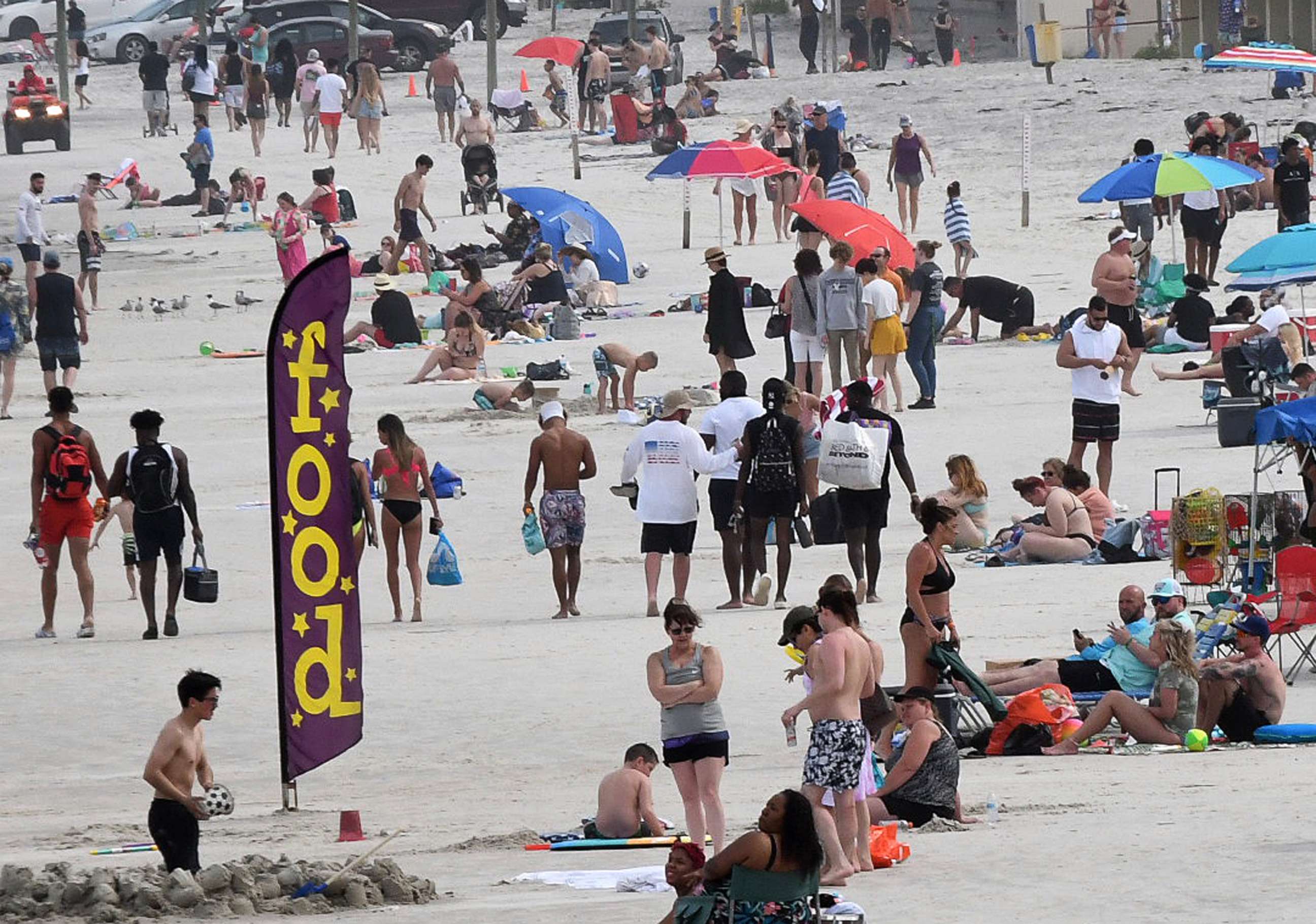 PHOTO: People enjoy the beach, March 24, 2021, in Daytona Beach, Fla. 