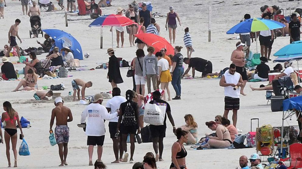 PHOTO: People enjoy the beach, March 24, 2021, in Daytona Beach, Fla. 