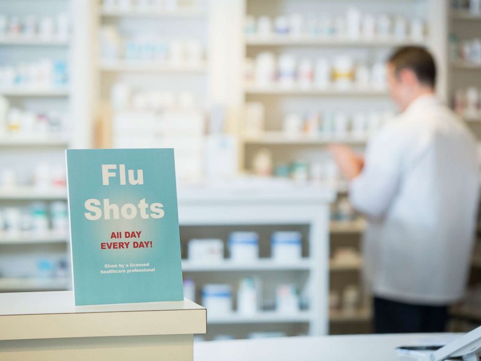 A sign of flu is seen in a pharmacy in this undated photo. 