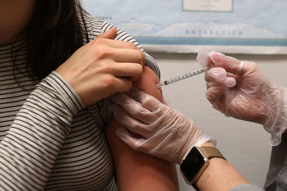 PHOTO: A woman receives a flu shot at a Walgreens phramacy, Jan. 22, 2018, in San Francisco, Calif. 