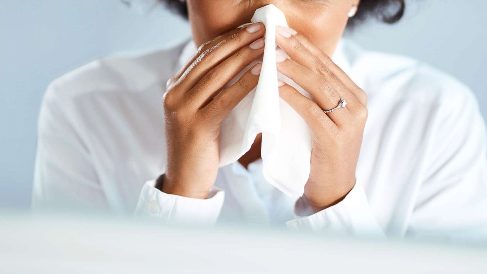 PHOTO: A woman blows her nose in this undated stock photo.