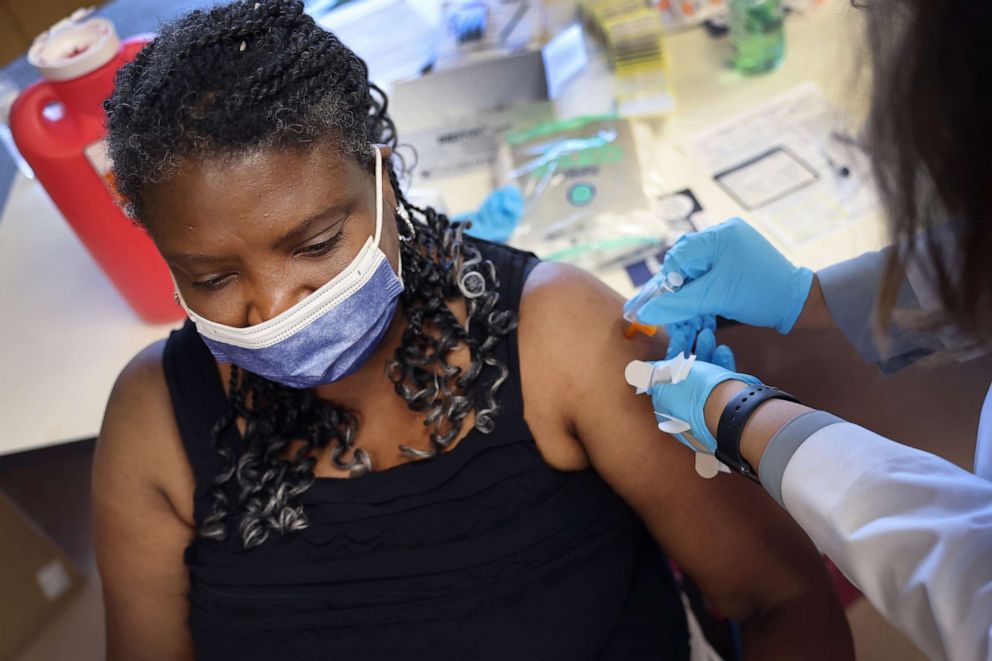 A woman gets an influenza vaccine during an event hosted by the Chicago Department of Public Health at the Southwest Senior Center on Sept. 09, 2022 in Chicago. 