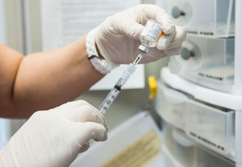 PHOTO: The annual flu vaccine is drawn from the vile into the needle, Feb. 7, 2015 at Crawford Kids Clinic in Aurora, Colo.