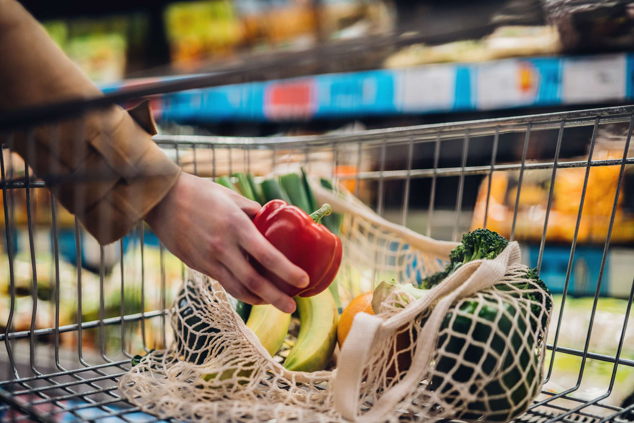 PHOTO: Fruits and vegetables are placed into a shopping cart in an undated stock image.