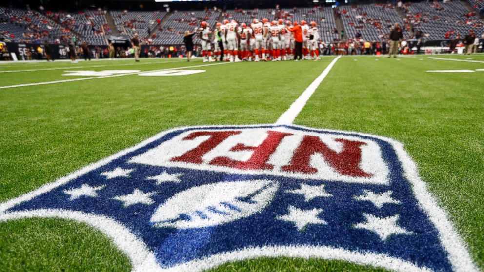 PHOTO: The NFL logo is shown as the Cleveland Browns huddle on the field before an NFL football game against the Houston Texans , Oct. 15, 2017, in Houston. 