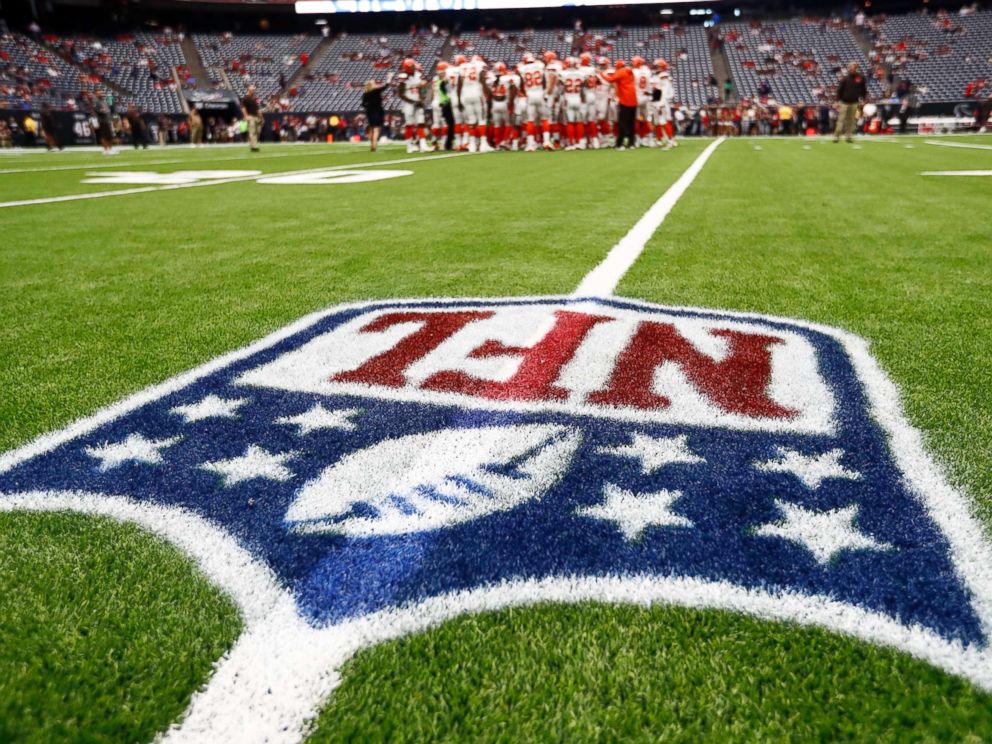 PHOTO: The NFL logo is shown as the Cleveland Browns huddle on the field before an NFL football game against the Houston Texans , Oct. 15, 2017, in Houston.