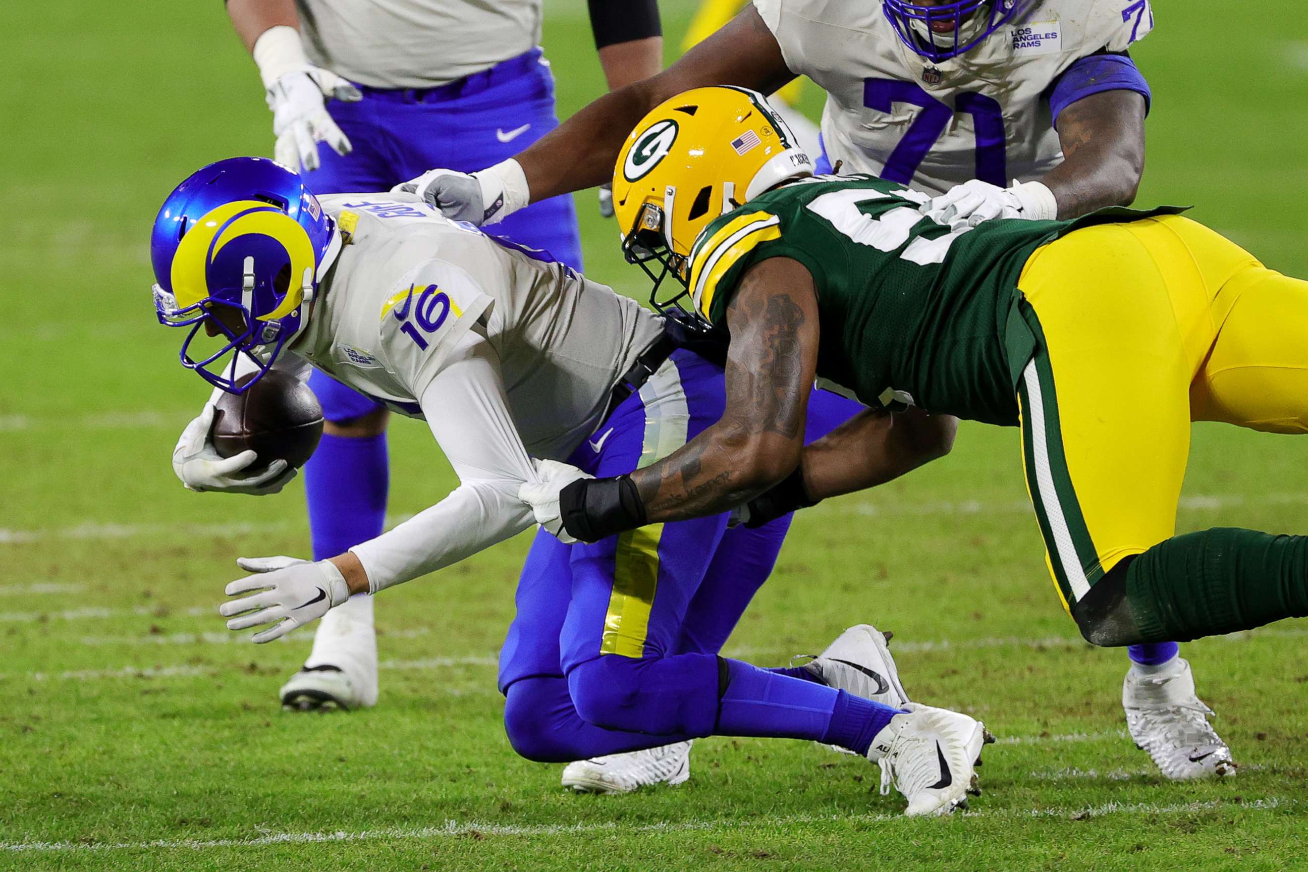 PHOTO: Rashan Gary of the Green Bay Packers sacks Jared Goff of the Los Angeles Rams in the third quarter during the NFC Divisional Playoff game at Lambeau Field on Jan. 16, 2021, in Green Bay, Wis.