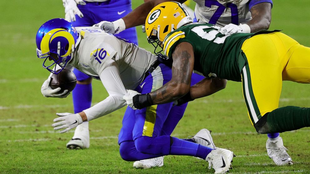PHOTO: Rashan Gary of the Green Bay Packers sacks Jared Goff of the Los Angeles Rams in the third quarter during the NFC Divisional Playoff game at Lambeau Field on Jan. 16, 2021, in Green Bay, Wis.