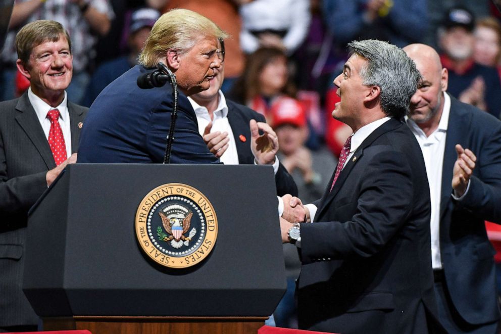 PHOTO: Sen. Cory Gardner joins President Donald Trump on stage during a Keep America Great rally on February 20, 2020 in Colorado Springs, Colorado.