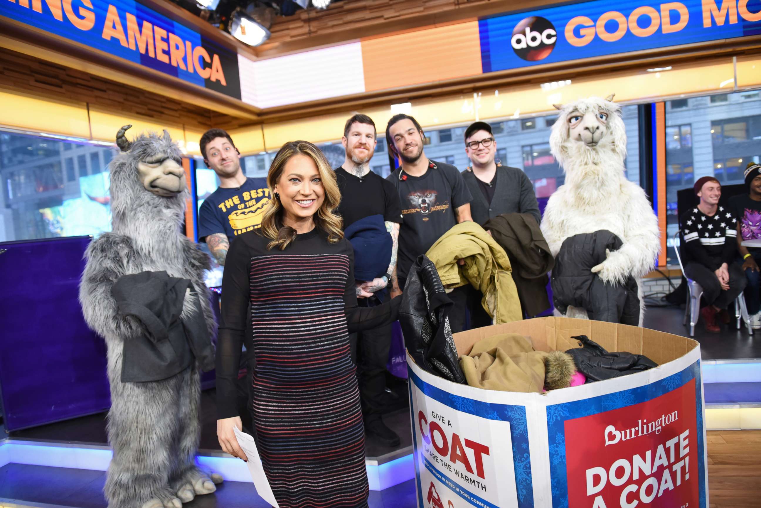 PHOTO: Fall Out Boy performs live on "Good Morning America," Jan. 19, 2018 posing with Ginger Zee.