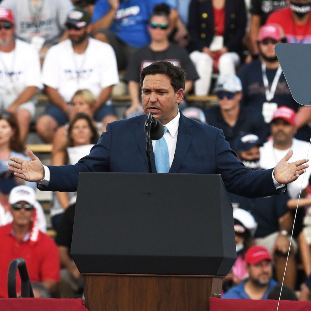 PHOTO: Florida Gov. Ron DeSantis addresses the crowd before President Donald Trump speaks to supporters at a Great American Comeback campaign rally at Cecil Airport in Jacksonville, Fla., Sept. 24, 2020.