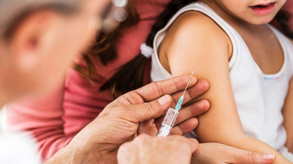 PHOTO: A child receives a flu shot in an undated stock photo. 