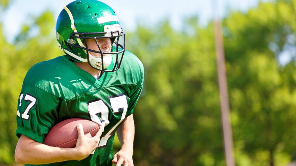 A high school football player.