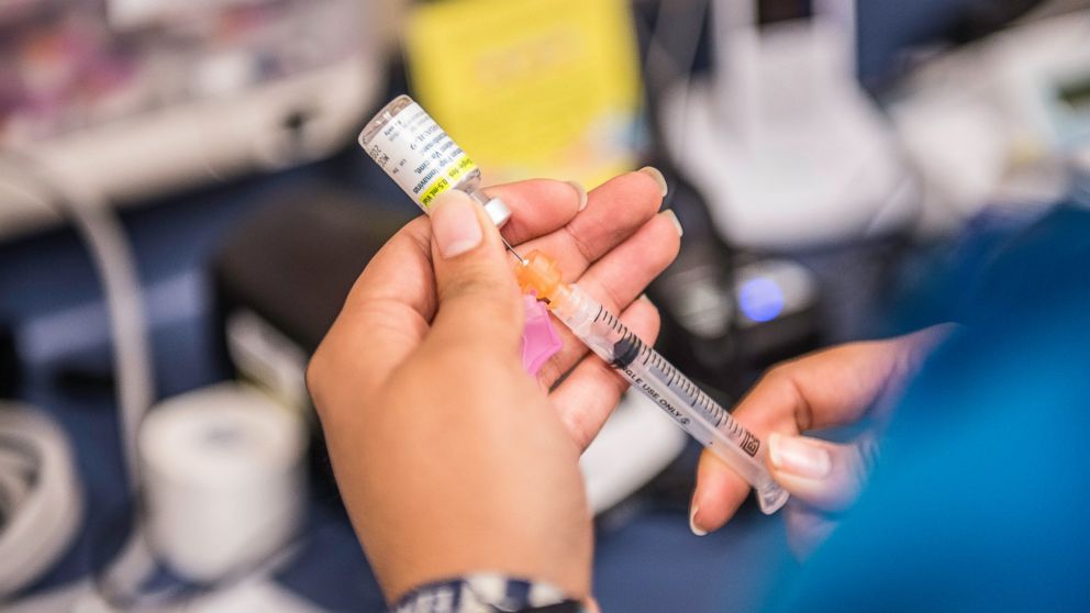 Certified medical assistant Karla Huerta fills a needle with the drug Gardasil, used for HPV vaccinations, at Amistad Community Health Center in Corpus Christi, Texas, May 27, 2016. 